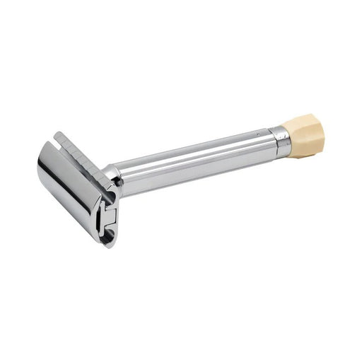 A Merkur Progress Long Handle Adjustable Safety Razor with a chrome-plated brass handle and die-cast zinc razor head.