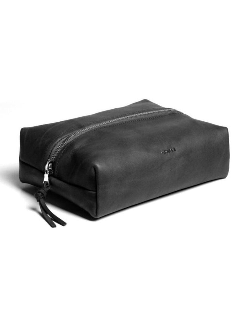 black stampede leather dopp kit with waterproof liner and ballglove lace zipper handcrafted in usa by nokona