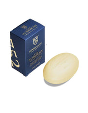 Bar of Number Six soap and its packaging on a white background