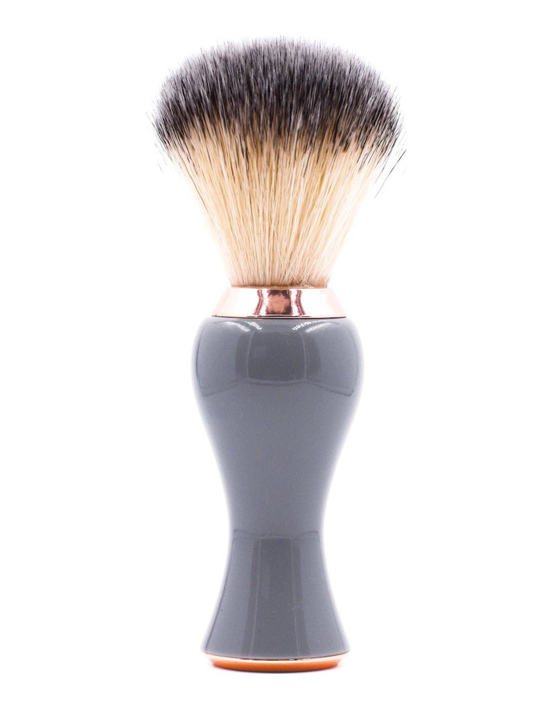 Parker synthetic shaving brush with a glossy gray handle and rose gold accents, shown upright on a white background