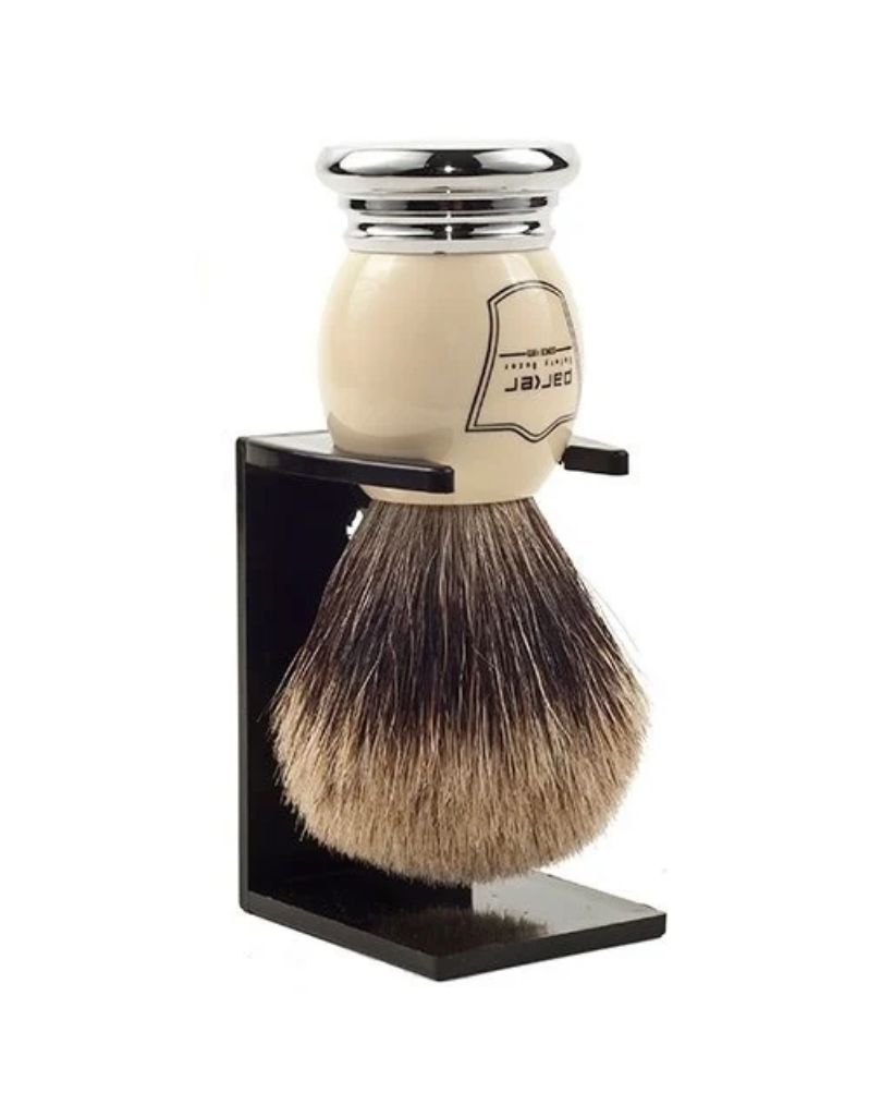 Parker Shaving brush with white handle and chrome accents, mounted on a stand