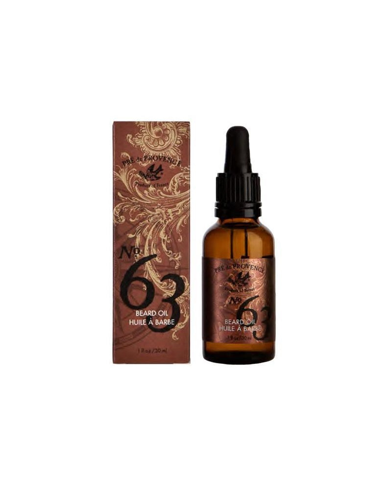 Pre de Provence No. 63 Men's Beard Oil packaging and bottle, featuring a brown box with gold designs and a amber glass bottle with a dropper.