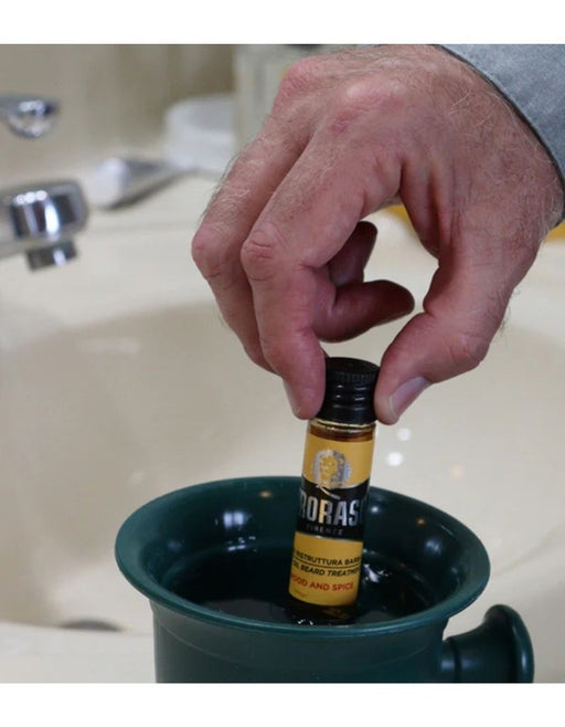 Warming up the hot oil beard treatment bottle
