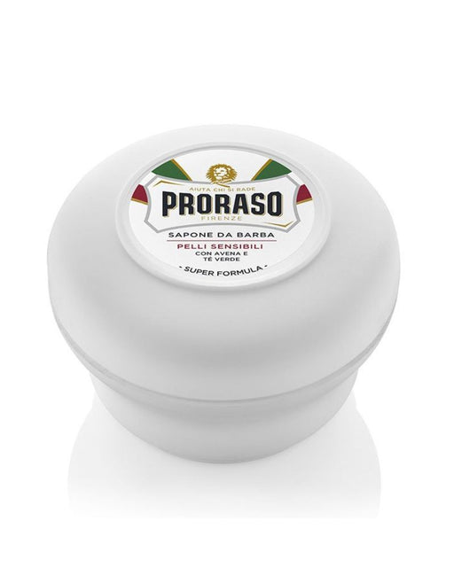 A white shaving soap container with the Proraso brand logo on the lid, indicating it is for sensitive skin.