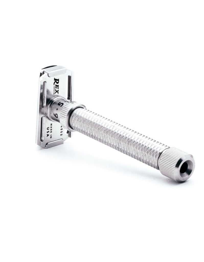 A silver-colored adjustable safety razor with a slanted blade and a knurled handle.