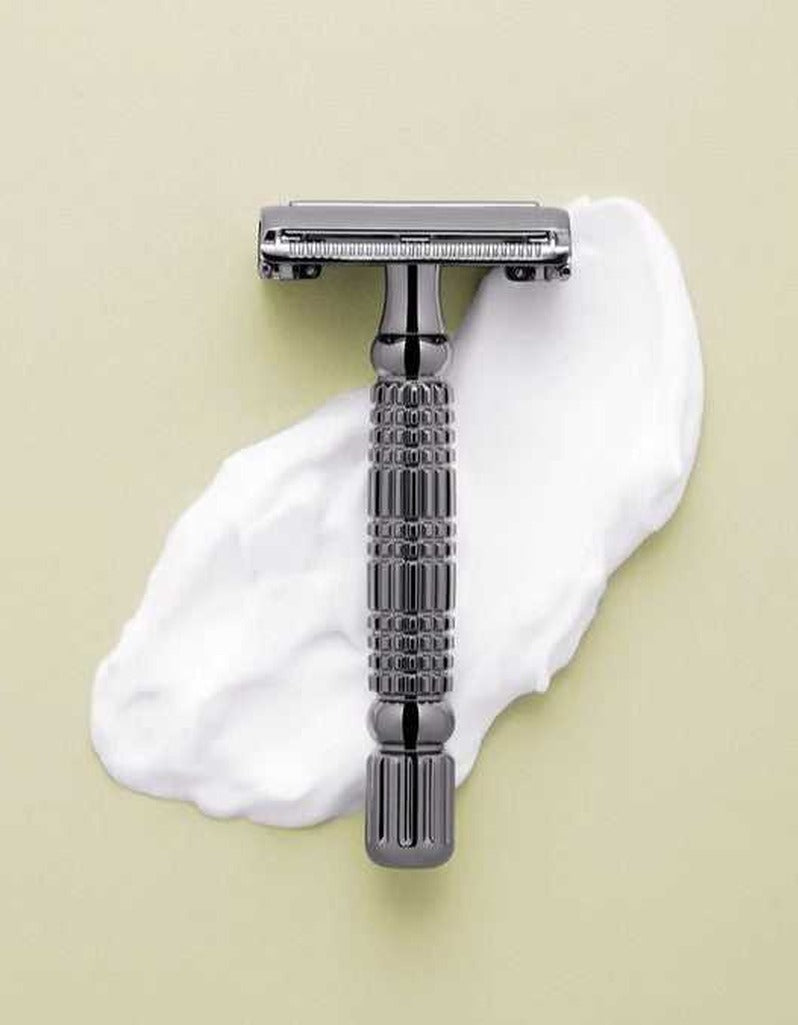Rockwell R1 safety razor in gunmetal chrome on shaving cream