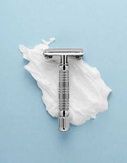 Rockwell R1 safety razor in white chrome on shaving cream