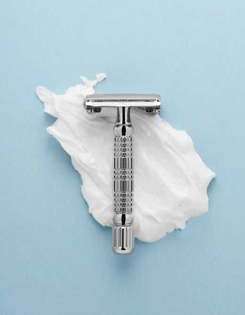 Rockwell R1 safety razor in white chrome on shaving cream