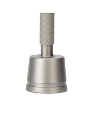 Rockwell SETPOINT razor stand in stainless steel with a tapered body, stepped base and center opening for the handle