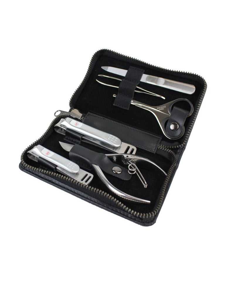 Japanese men's grooming kit with clippers, nail nipper, scissors, and tweezers in a black travel case