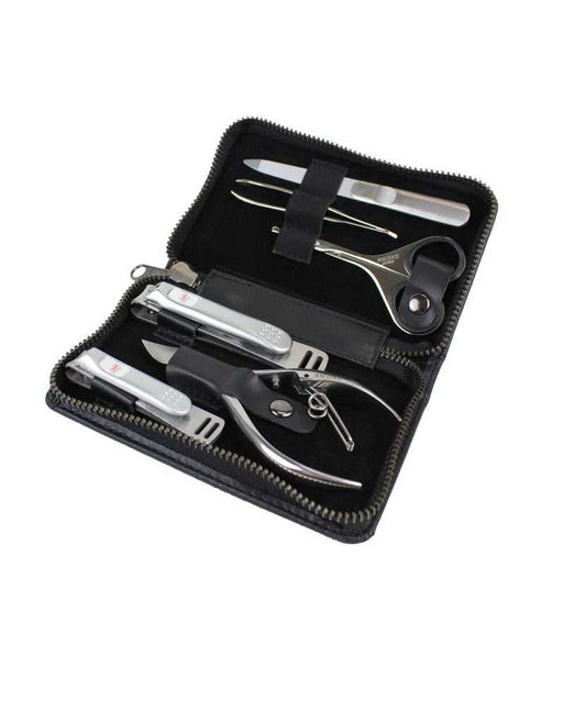 Japanese men's grooming kit with clippers, nail nipper, scissors, and tweezers in a black travel case
