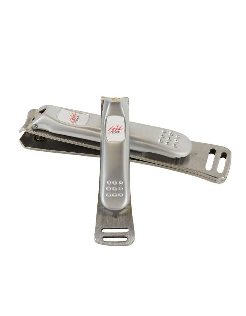 Metallic nail clipper branded Seki Edge on a white background