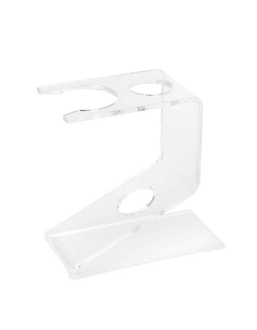 A clear acrylic shaving brush and safety razor stand.