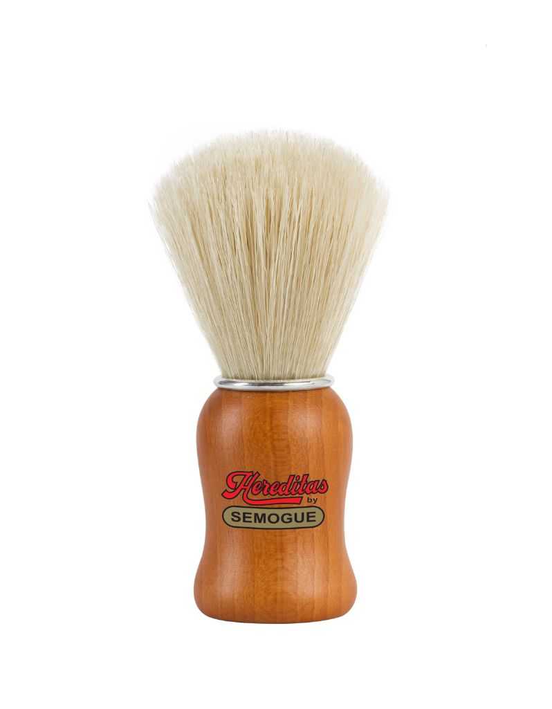 A Semogue 1470 Hereditas shaving brush with boar bristles and a natural matte finish beech wood handle with an aluminum ring.
