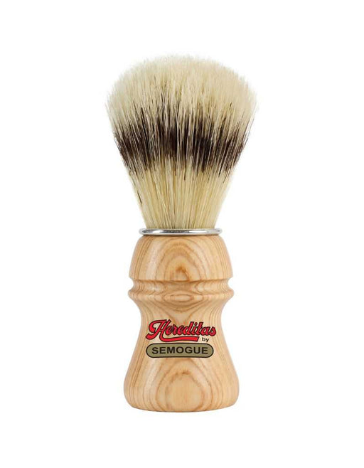 A Semogue 1800 Hereditas Extra boar bristle shaving brush with an ash wood handle and a chrome plated ring.