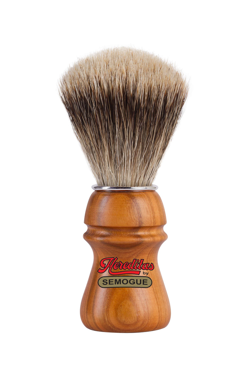 A Semogue shaving brush with a cherry wood handle and finest badger bristles, displayed with the knot facing up.