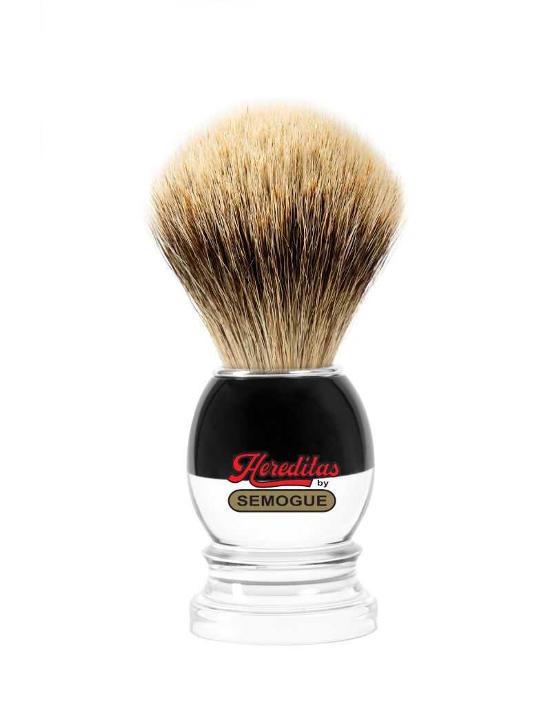 A Semogue shaving brush with finest badger bristles, a black and clear striped handle, and an aluminum plated ring.