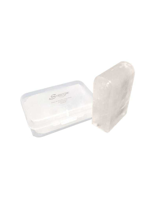 Semogue Alum Stone in  clear plastic container with a lid on a white background