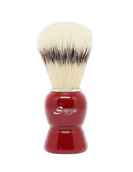 A Semogue shaving brush with a fan-shaped knot of boar bristles, Imperial Red handle, and chrome plated ring.