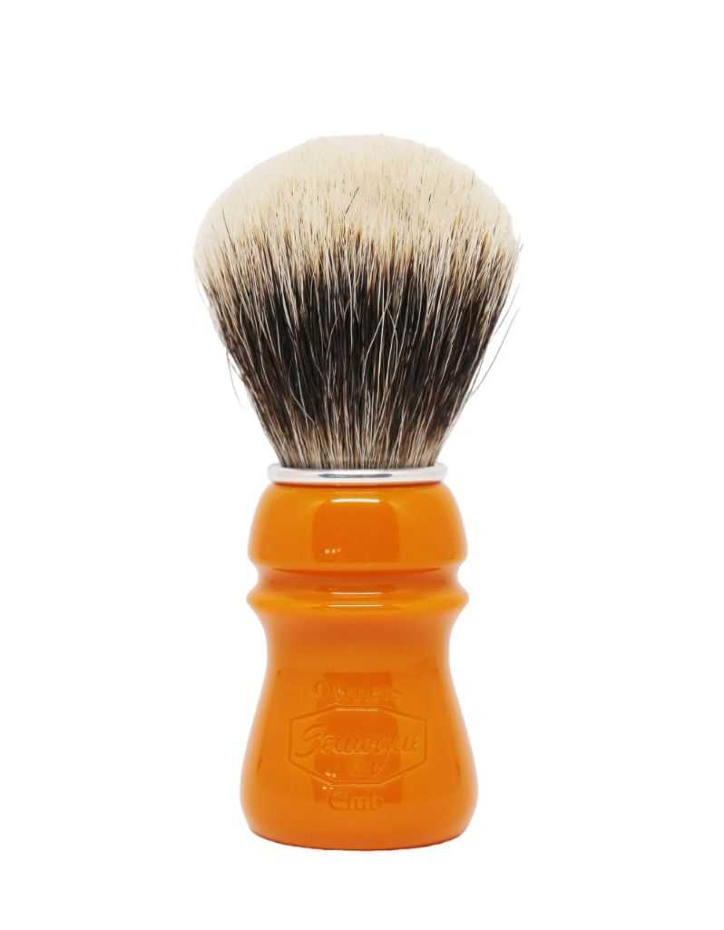 A Semogue shaving brush with finest badger bristles, featuring a butterscotch colored handle and a fan shaped knot.