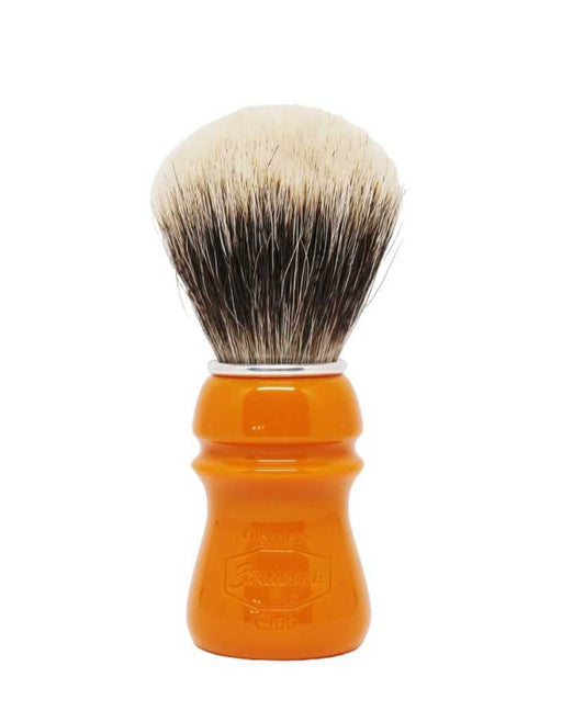 A Semogue shaving brush with finest badger bristles, featuring a butterscotch colored handle and a fan shaped knot.
