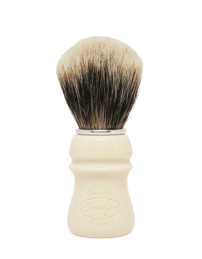 A Semogue shaving brush with a beige handle and finest badger bristles, showing the brush head, handle, and aluminum ring.