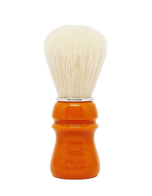 A Semogue shaving brush with a butterscotch colored handle and white boar bristles, viewed from the side.