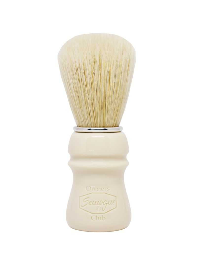 A Semogue shaving brush with a Taj handle and boar bristles, displayed against a white background.