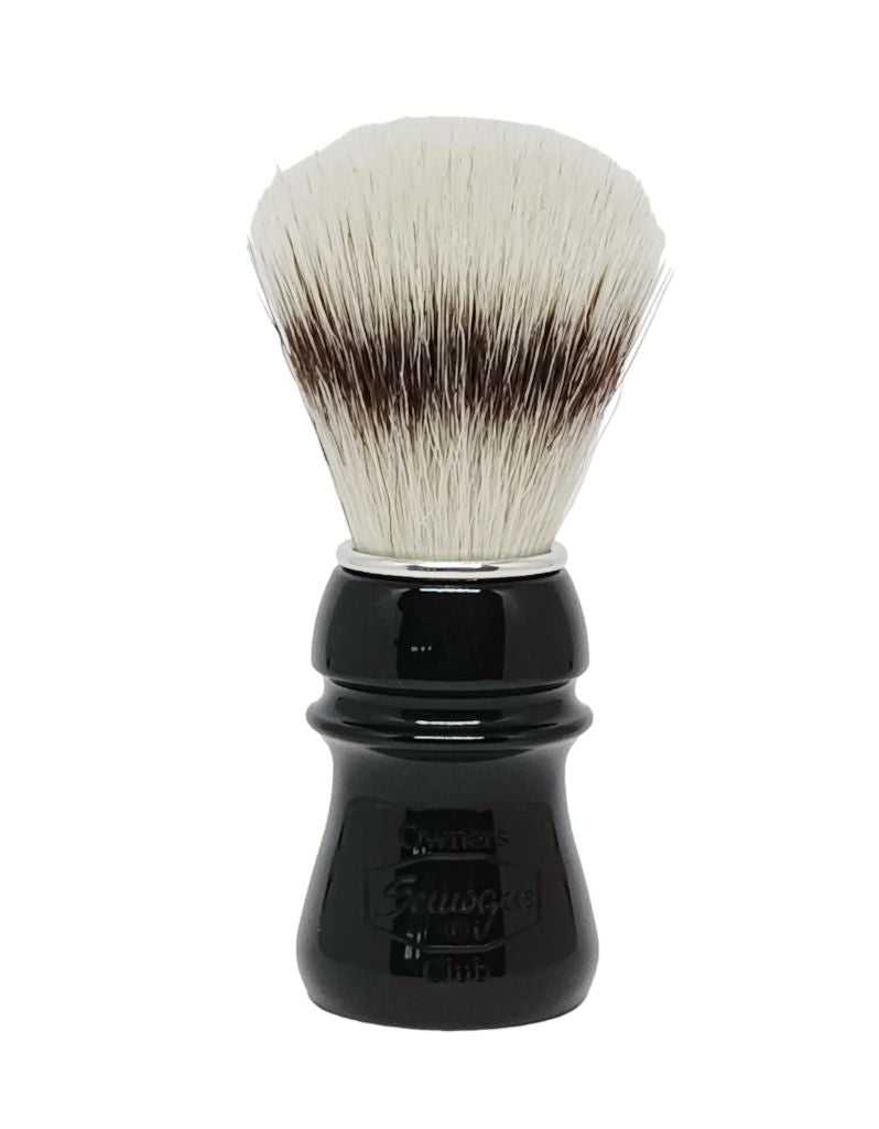 A shaving brush with synthetic bristles, jet black handle, and aluminum ring.
