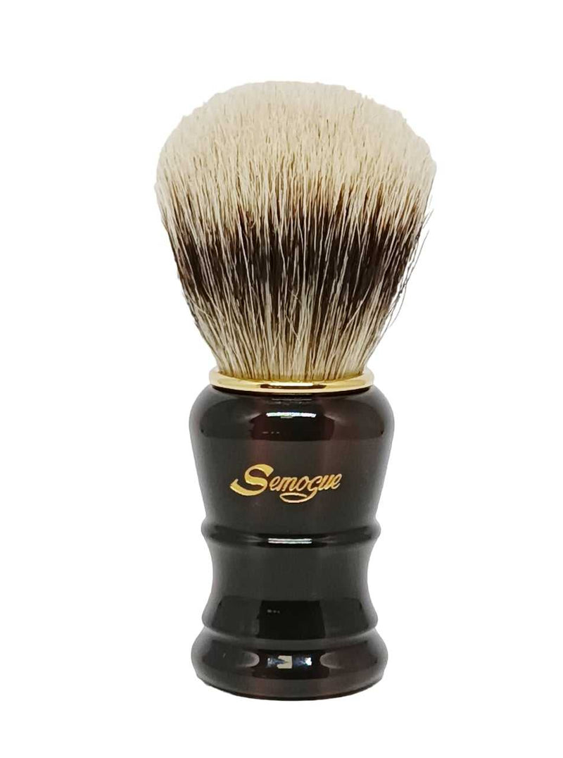 A Semogue Pegasus C7 shaving brush with a tortoiseshell handle and a fan shaped knot of bristles.