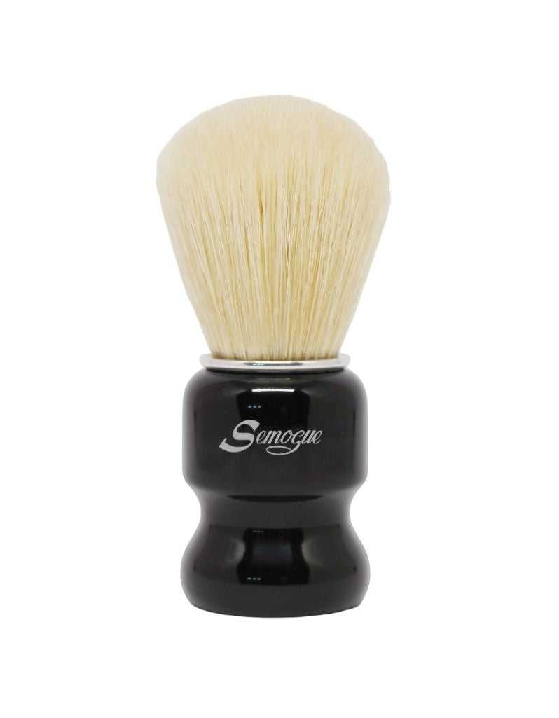 A Semogue Torga C5 premium boar bristle shaving brush with a jet black handle and a fan-shaped knot of bristles.