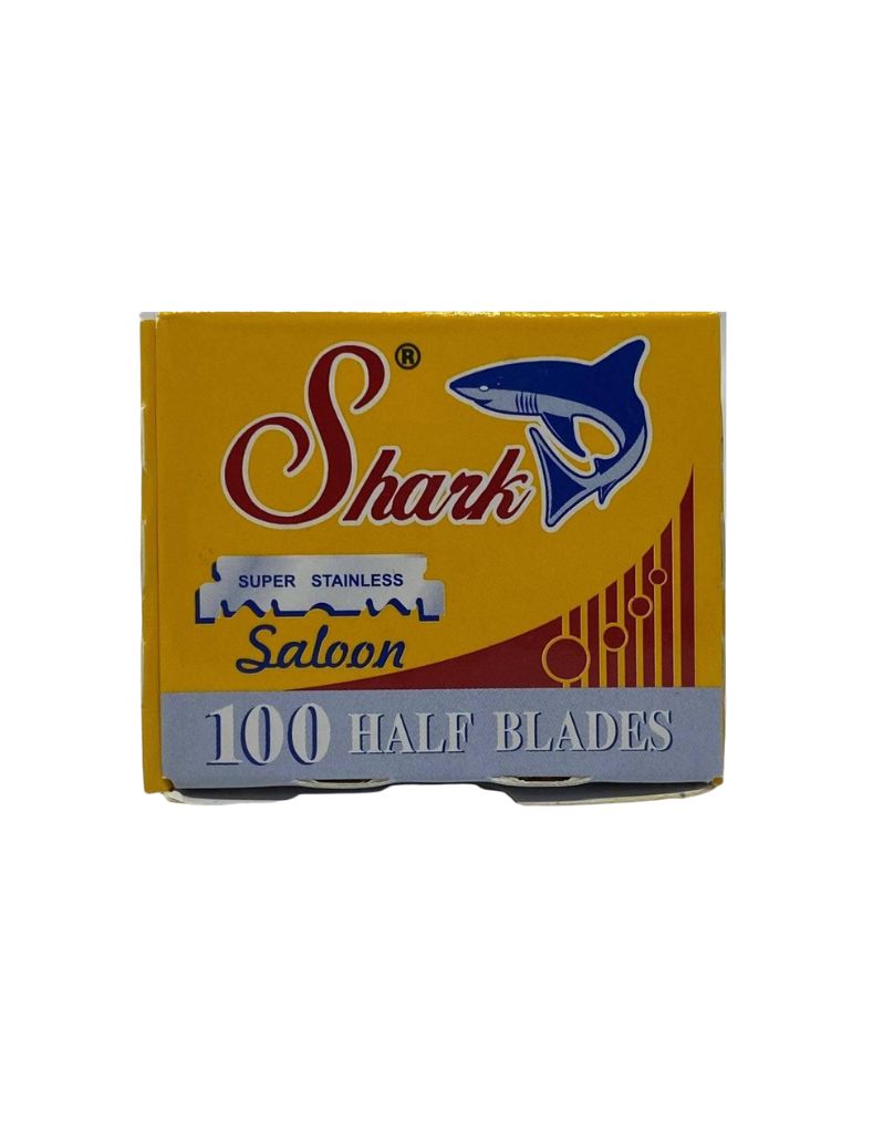 Box of Shark brand half blades with yellow and blue design on a white background