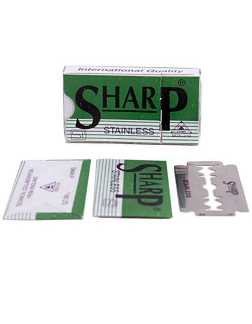 Sharp stainless steel razor blades with packaging on a white background