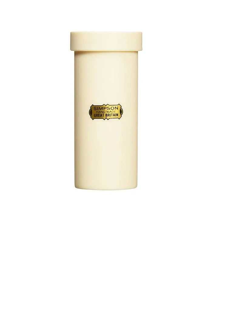 A small faux ivory travel tube with a screw top lid, featuring an authentic Simpson decal on the front.