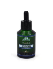 Stirling Executive Man Beard & Pre-Shave Oil 2 oz dark green bottle with dropper on white background.