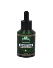 Stirling Gentleman tobacco amber vanilla musk beard and pre-shave oil bottle on white background.