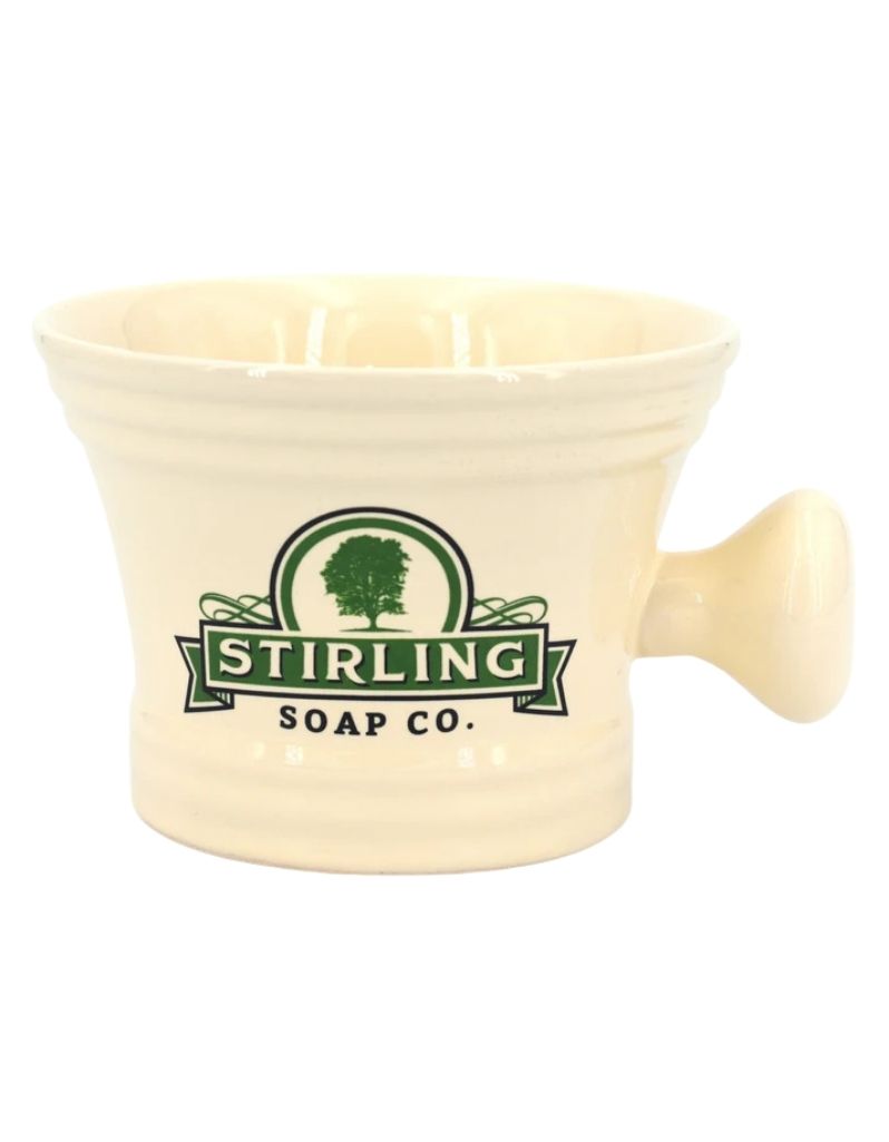 Stirling Soap Co. cream ceramic apothecary shaving mug with logo and ridged base for shave soap pucks. Cream color.