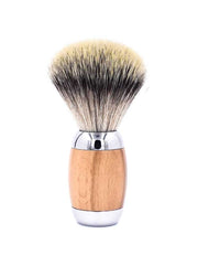 A synthetic shaving brush with a beechwood and chrome handle, accompanied by an acrylic stand.