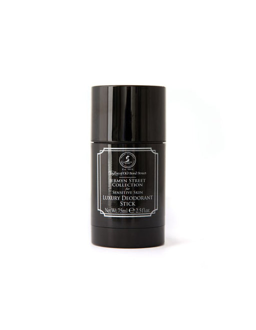 Black deodorant stick with a label on a white background
