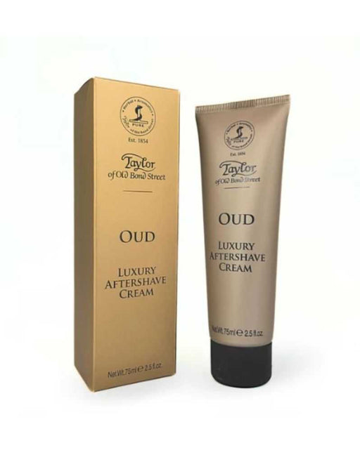 A tube of Taylor of Old Bond Street Oud Luxury Aftershave Cream next to its packaging box.