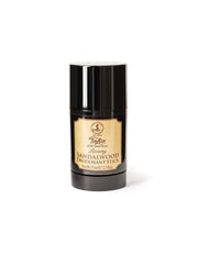 A black deodorant stick with a gold label that reads 'Taylor of Old Bond Street Sandalwood Deodorant Stick'.