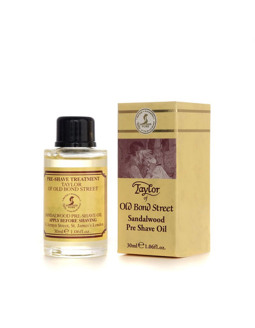 A bottle of Taylor of Old Bond Street Sandalwood Pre-Shave Oil alongside its packaging box.