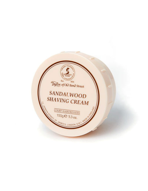 Round container of sandalwood shaving cream with branding on a white background