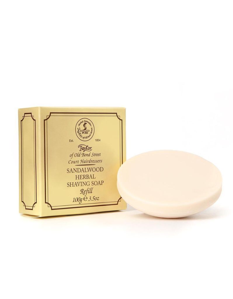 Sandalwood herbal shaving soap refill and packaging on a white background