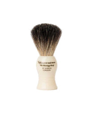 Shaving brush with a white handle and black bristles on a white background