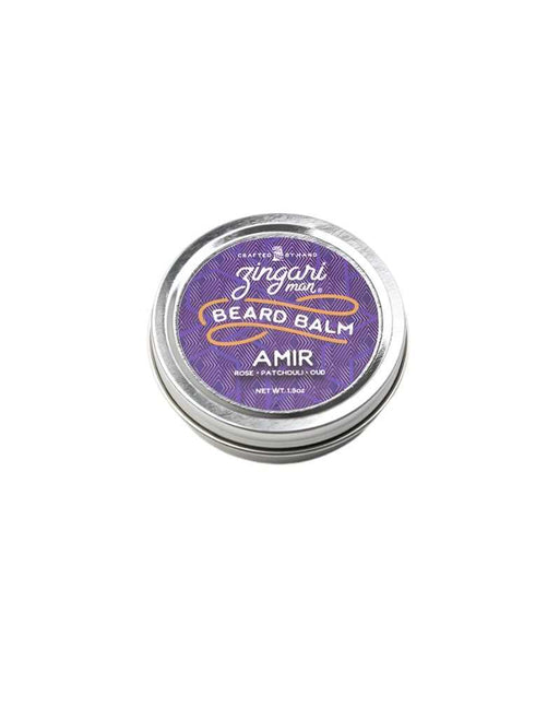 The Amir Beard Balm in a round tin with natural oils and a warm rose-oud scent inspired by timeless Middle Eastern royalty.