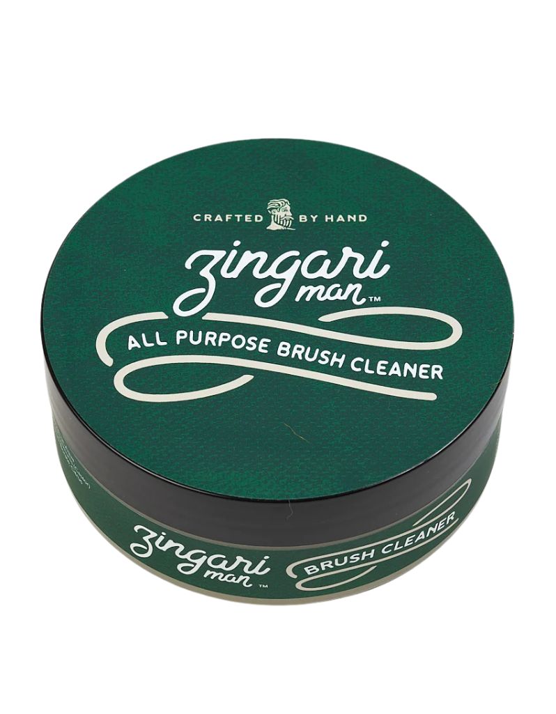 Green container of zingari man all-purpose brush cleaner on a white background
