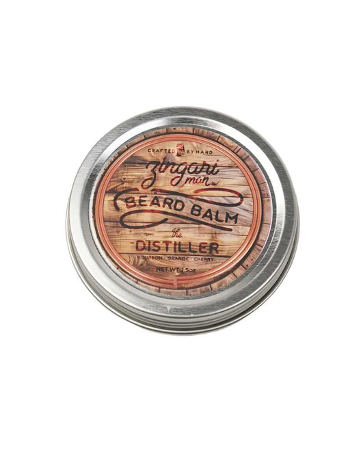 Beard balm container with wooden design and metallic lid on a white. Distiller beard balm tin with bourbon citrus scent