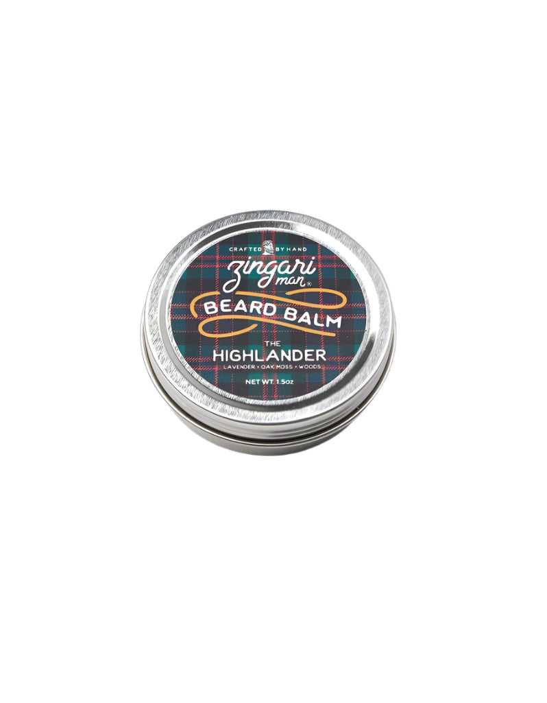 The Highlander Beard Balm in a 1.5 oz tin with natural ingredients and a bold herbal scent inspired by the Scottish Highlands.