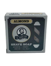 Packaging of Colonel Conk Almond Shave Soap with a round soap puck visible through the window.